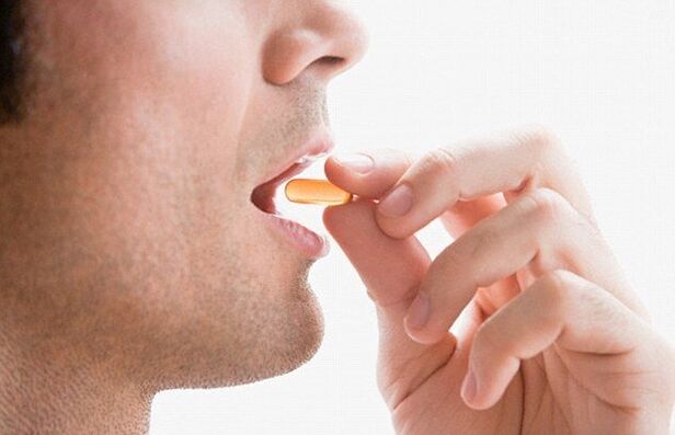 A man takes a vitamin complex to maintain potency